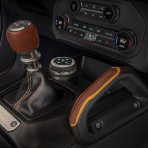 Customization details include an available leather-wrapped shift lever for the class-exclusive 7-speed manual transmission, as well as grab handles in this prototype version of the 2021 Bronco (not representative of production model). (Static display on private property with aftermarket accessories not available for sale.)